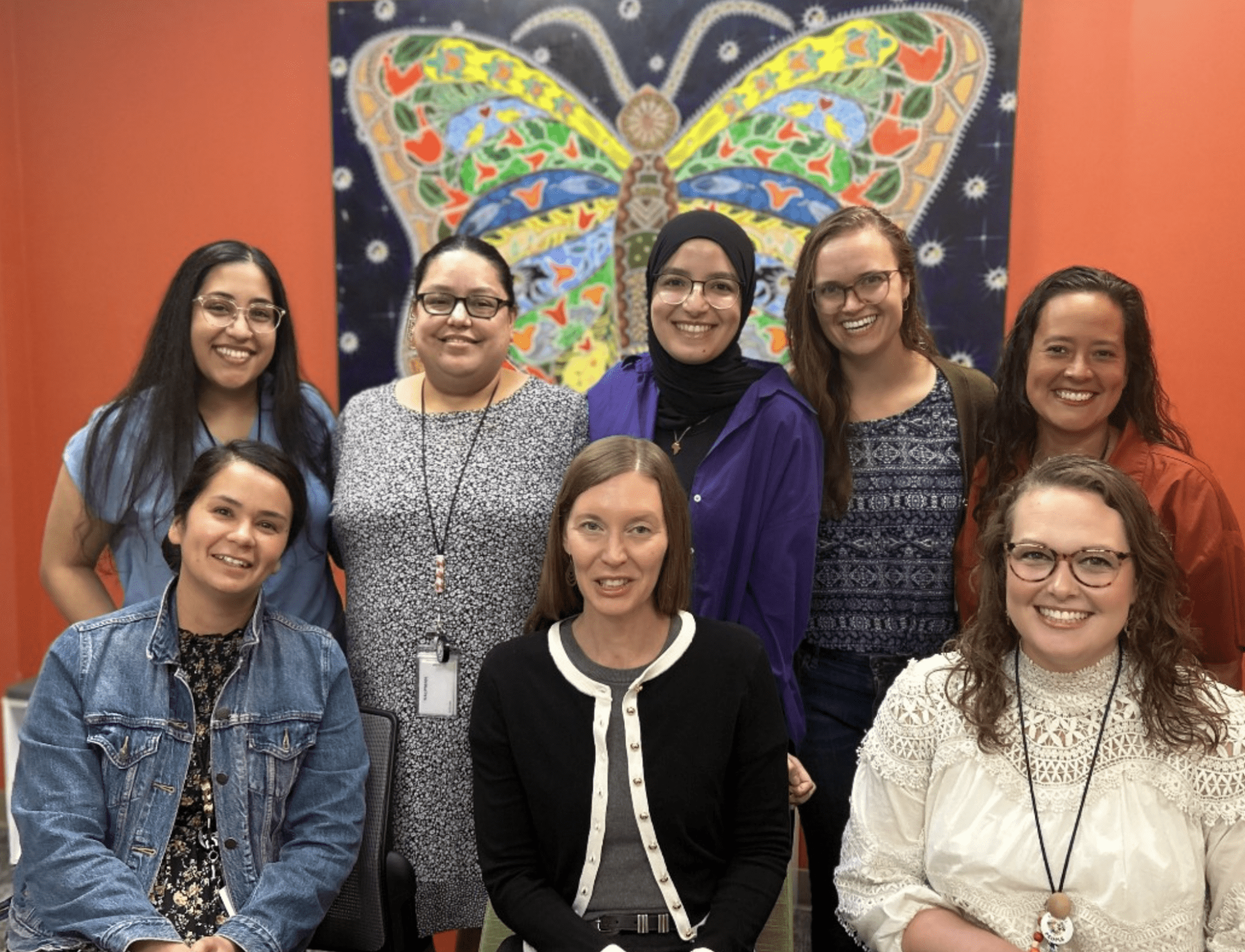 a group of women posing for a photo