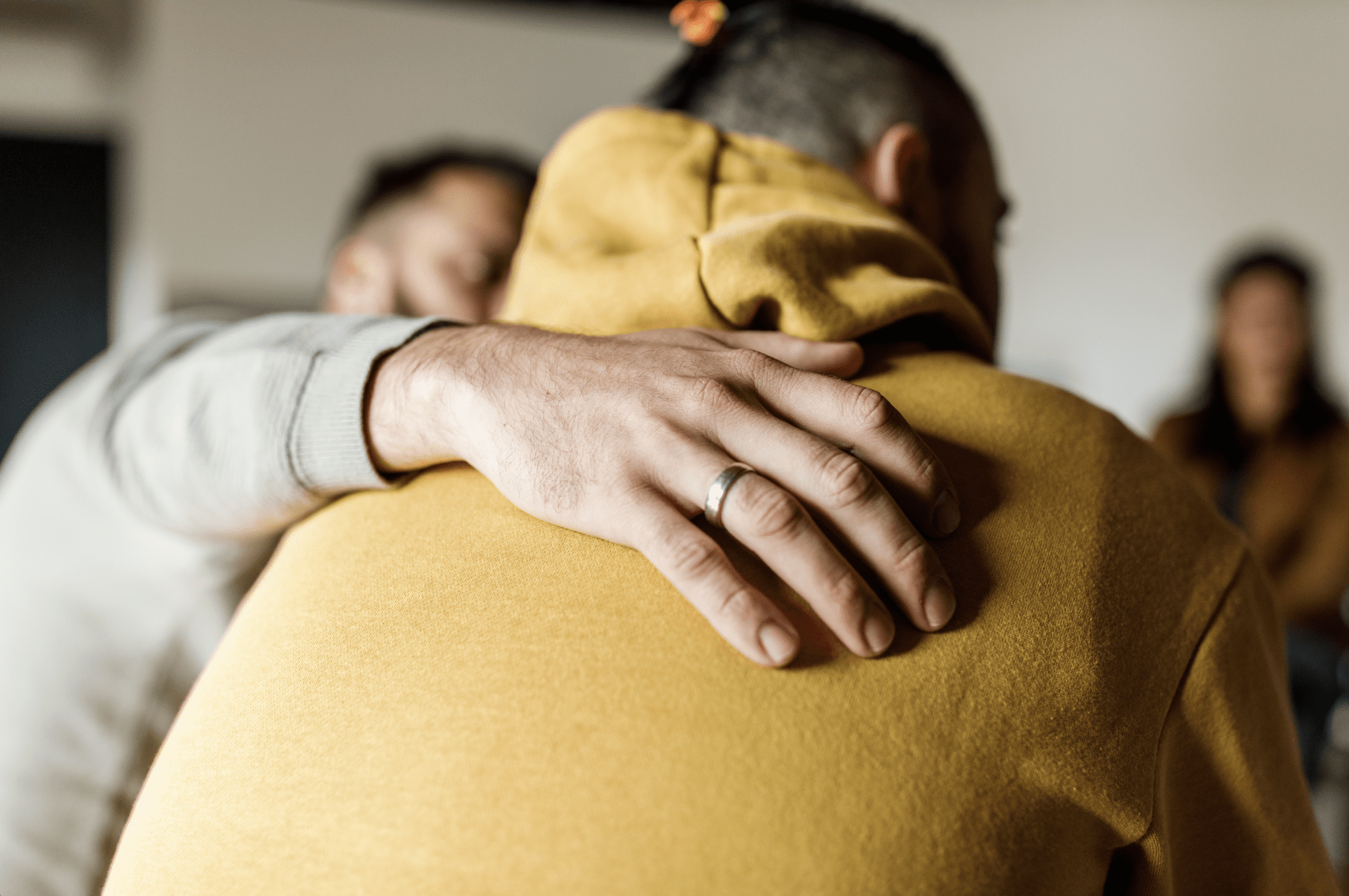 a person hugging a person