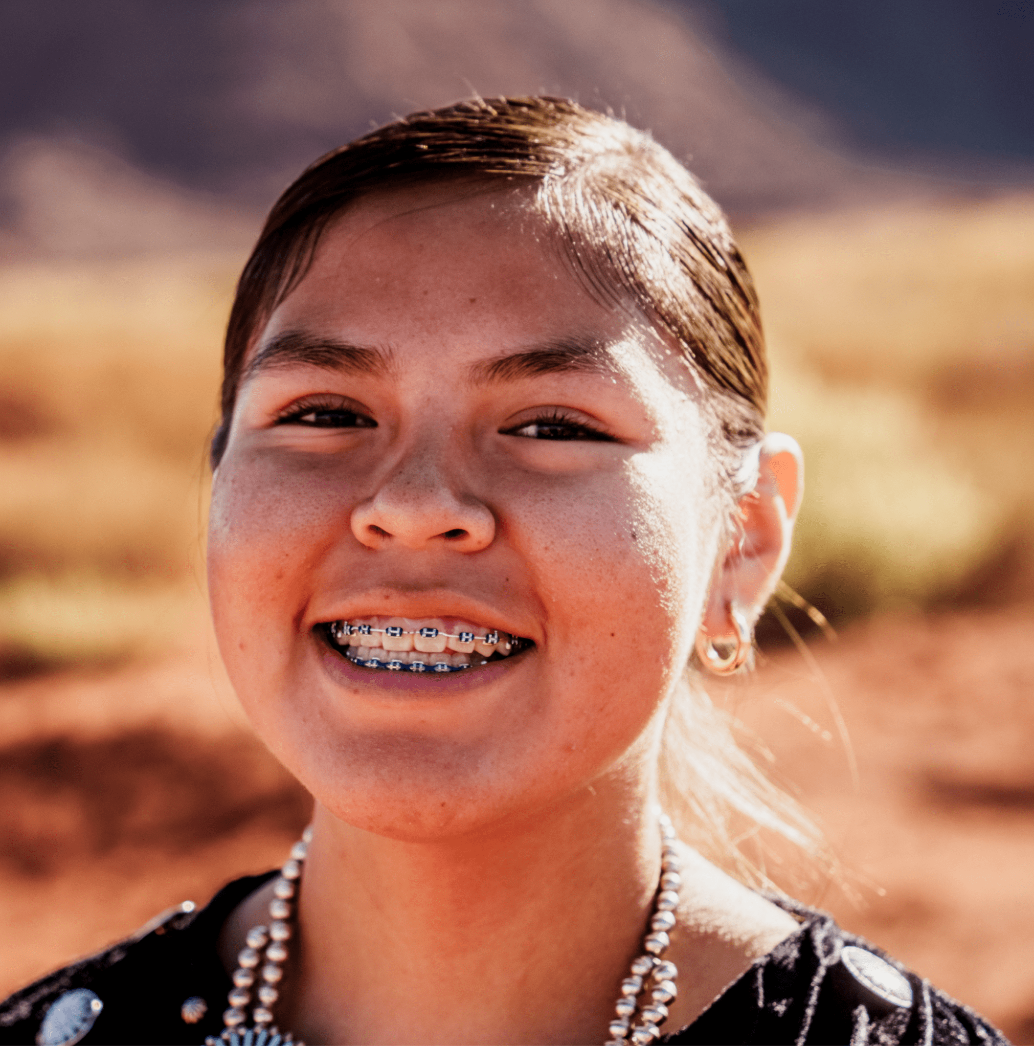 a child smiling with braces